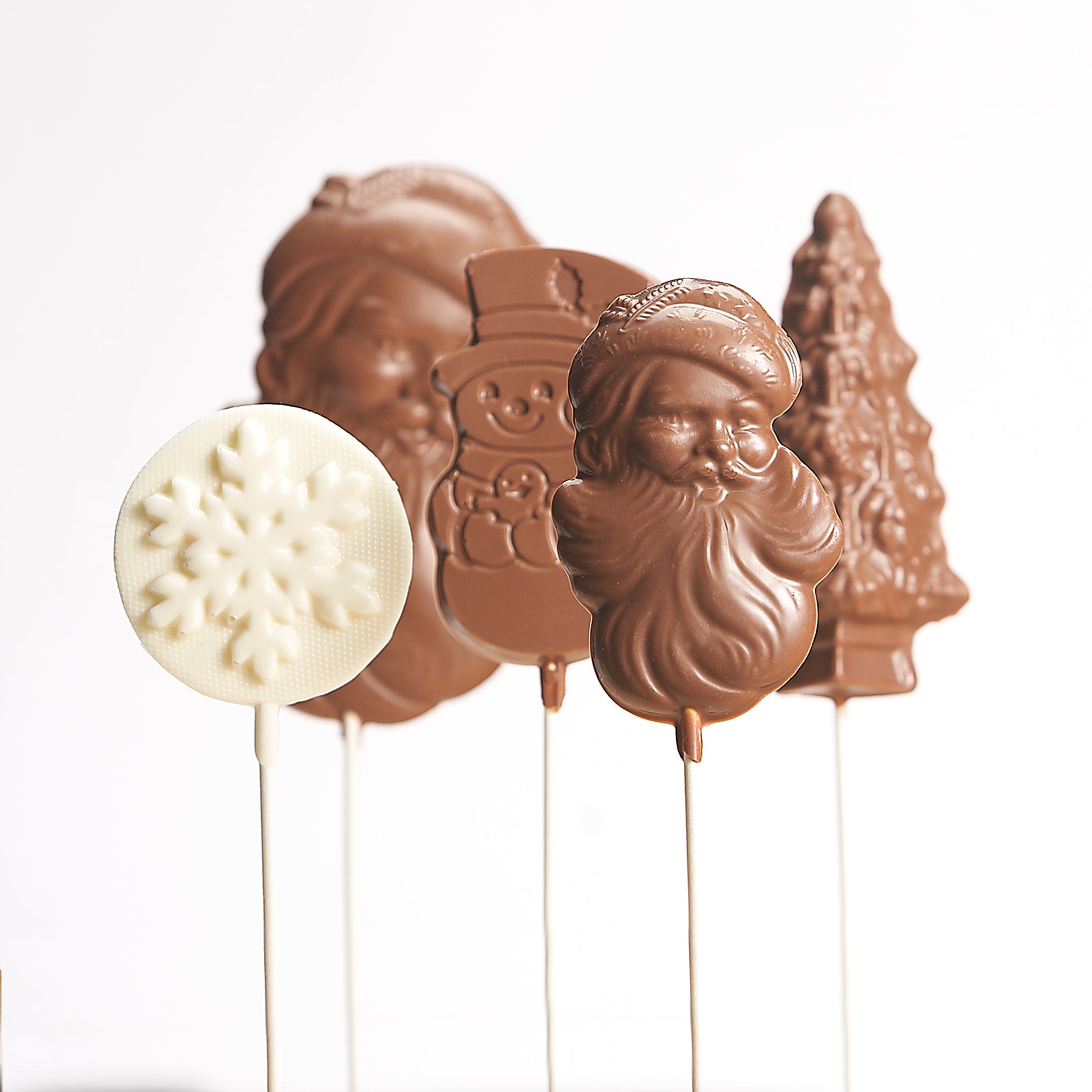 Various Christmas themed chocolate suckers