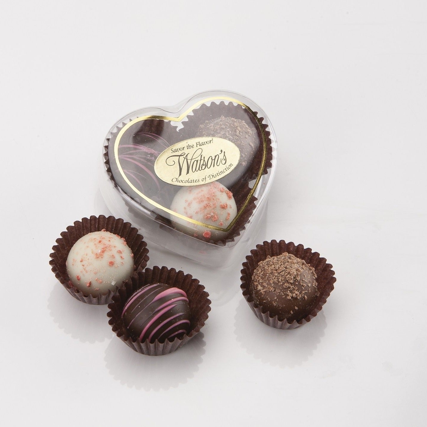 3 piece truffle in a heart container