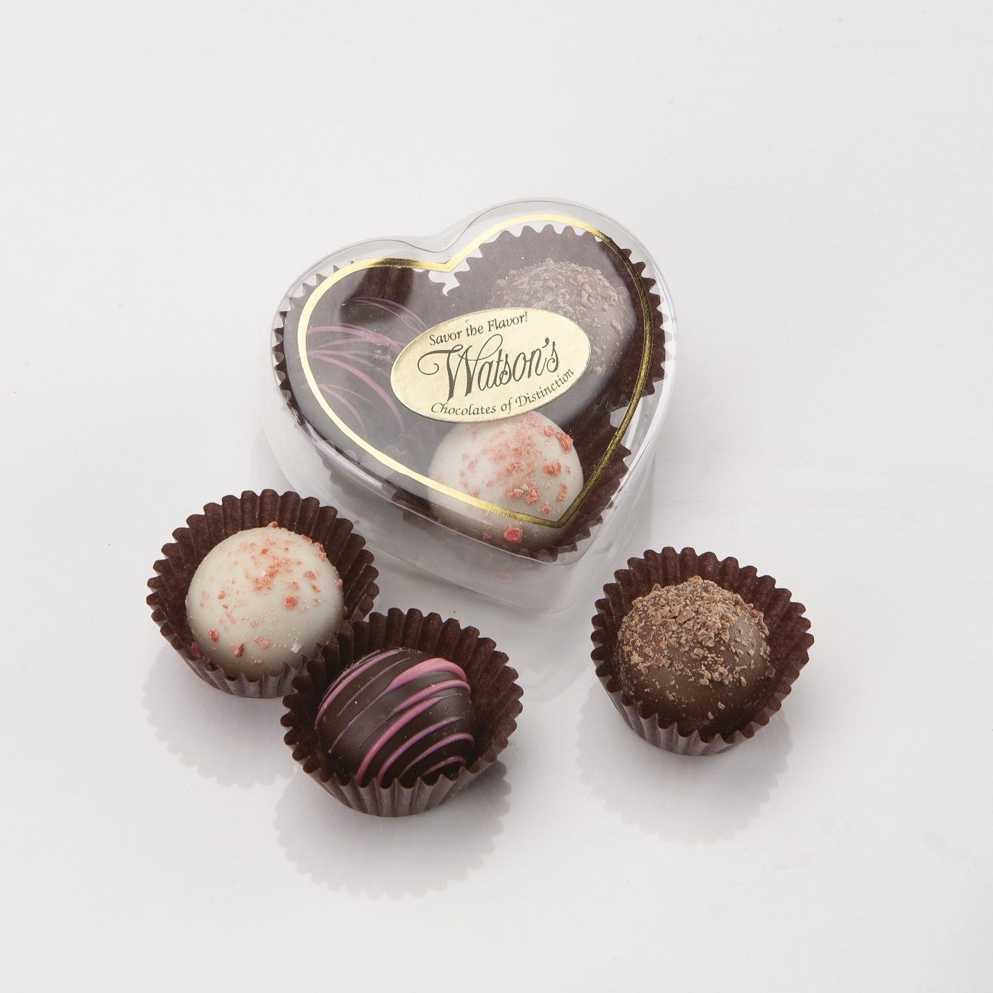 3 piece truffle in a heart container