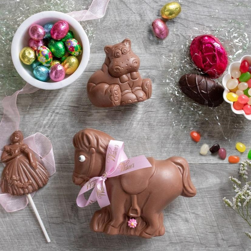 chocolate pony, ballerina sucker, a hippo, cream egg, marshmallow egg, foiled eggs, and jelly beans